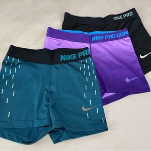 Nike Pro Shorts Trio in Teal, Purple, and Black